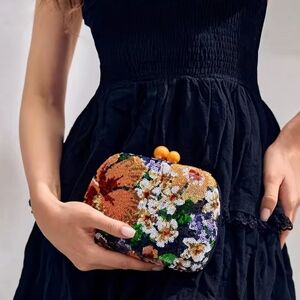Nwt sequin floral clutch Beaded